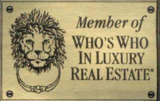 A Sign With Who's Who In Luxury Real Estate