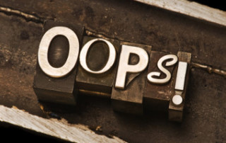 "Oops!" photographed using a mix of vintage letterpress characters. Cross-proccessed for a vintage look.