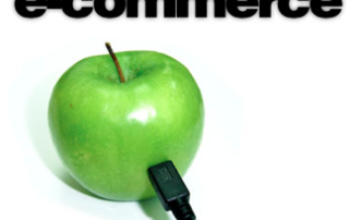 An Apple Has a USB Cable Plugged into it With E Commerce Written Above. A concept