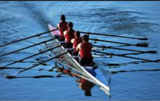 Rowers In A Boat Rowing