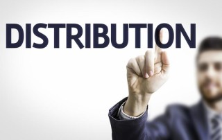 Man out of focus pointing at text that says "Distribution".