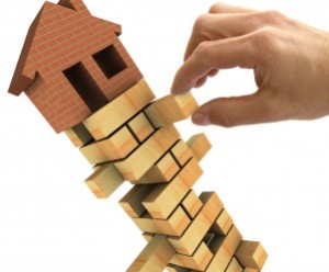 A House On Top Of A Jenga Tower