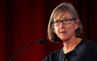 Picture Of Mary Meeker Speaking Into A Podium Mic