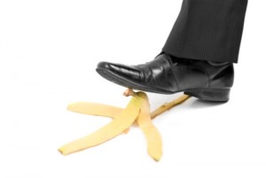 A Persons Foot About To Step On A Banana Peel