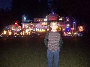 boy and christmas lights