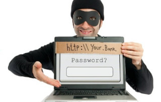 Phishing Warning and Burglar Holding Laptop