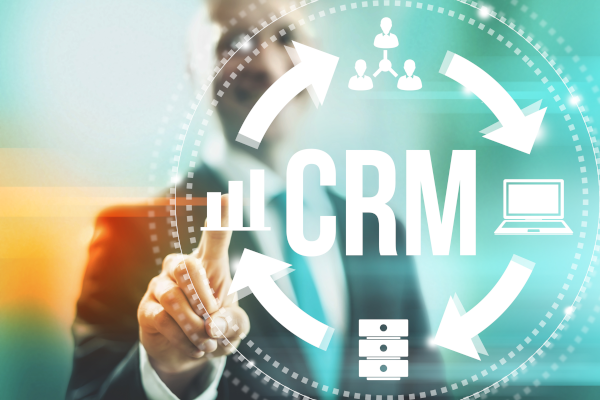 man pointing with his finger touching a digital visualization of CRM