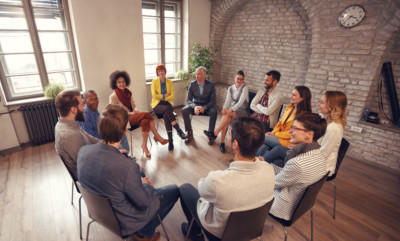 a circle of people talking