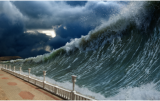 huge wave right before it breaks over railing