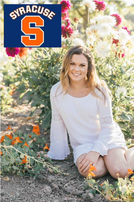 alexandra lund with syracuse sign