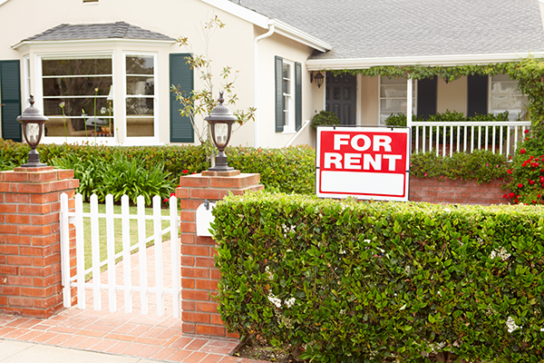 rental home with shrubs 