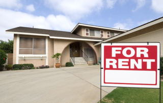 for rent sign in front of house