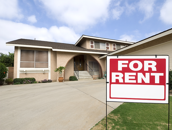 for rent sign in front of house