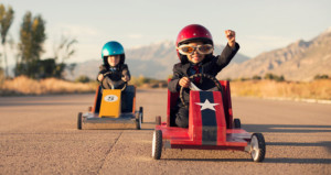 Two young boys in go-karts