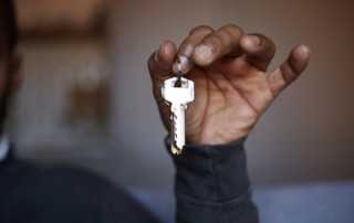 Man holding key