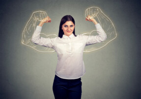 powerful girl flexing her muscles
