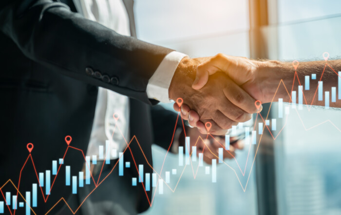 Double exposure of Teamwork,partnership and Social connection in business,Finishing up a meeting,handshake of happy business people after contract agreement to become a partner,collaborative teamwork.