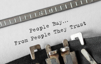 Text People Buy From People They Trust typed on retro typewriter