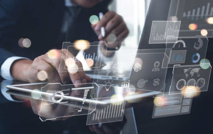 Data scientists, Programmer using digital tablet and laptop computer analyzing information on futuristic virtual interface screen. Algorithm, Data engineering, business and digital software technology