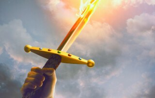 The Sword of the Spirit with flames and glowing lights coming down from heaven.